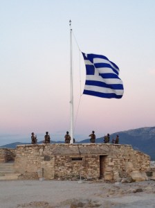 Greek militia taking down the flag