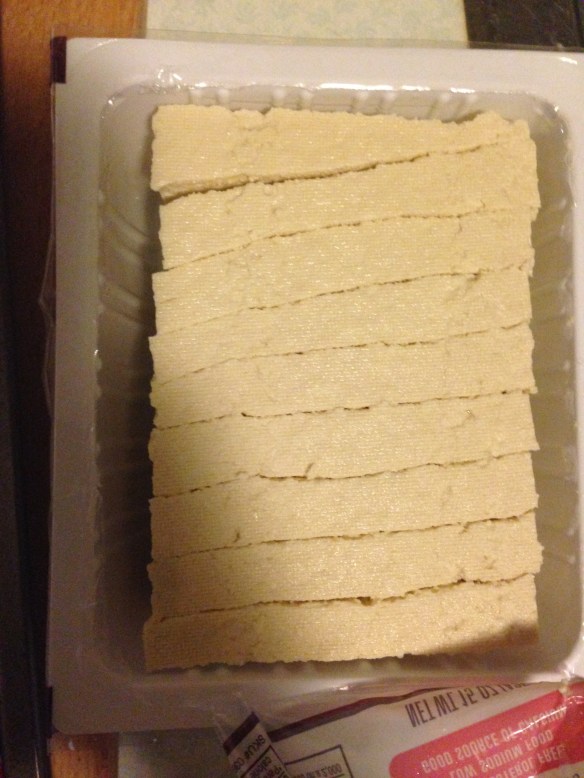 Slice the tofu into 1/2" slices in the container