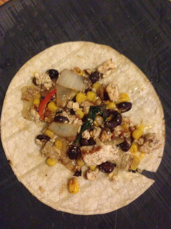 Add the taco filling on top of the cheese.